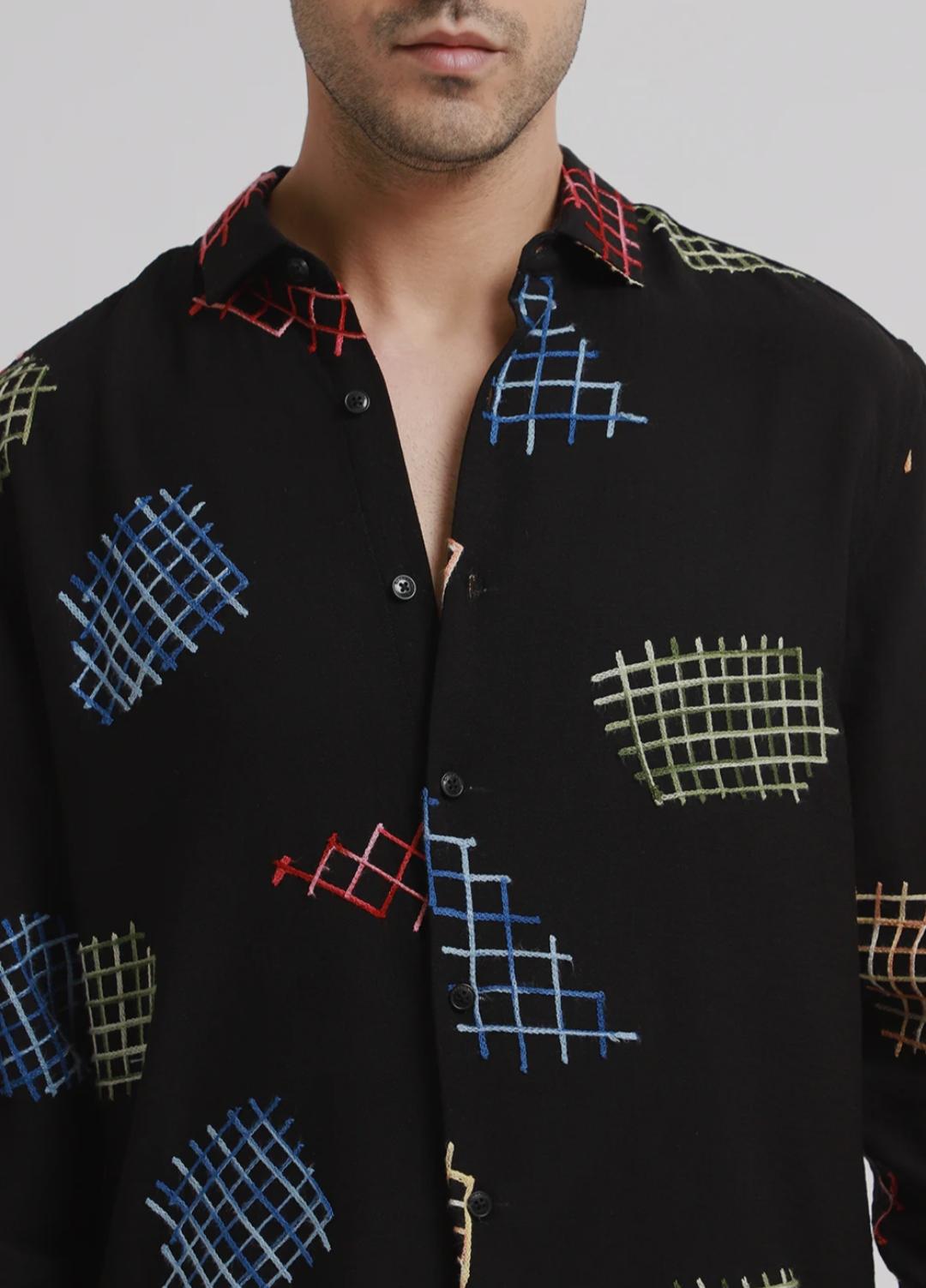 black embroidered shirt with geometric design