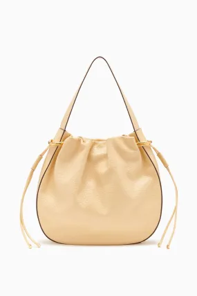 Tilda Ruched Hobo, Wheat - Shop Now.