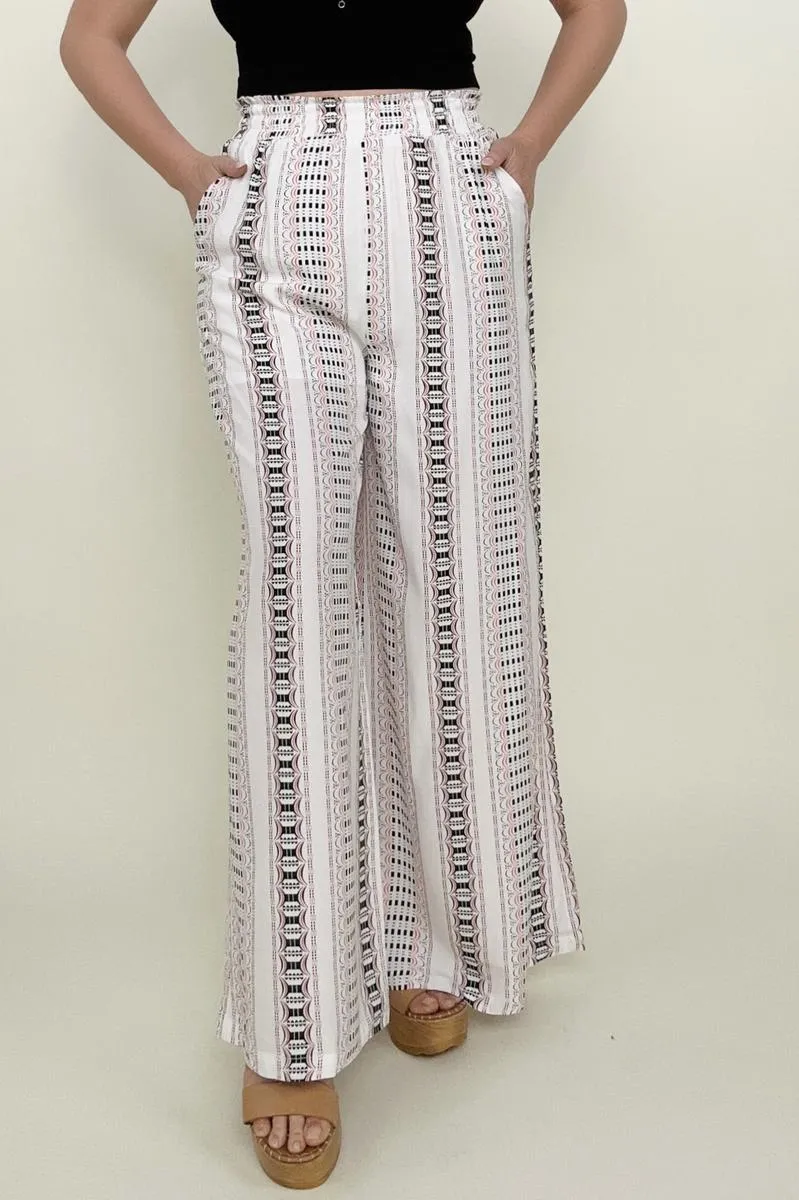 Wide leg pants with geo stripe and smocked waist.