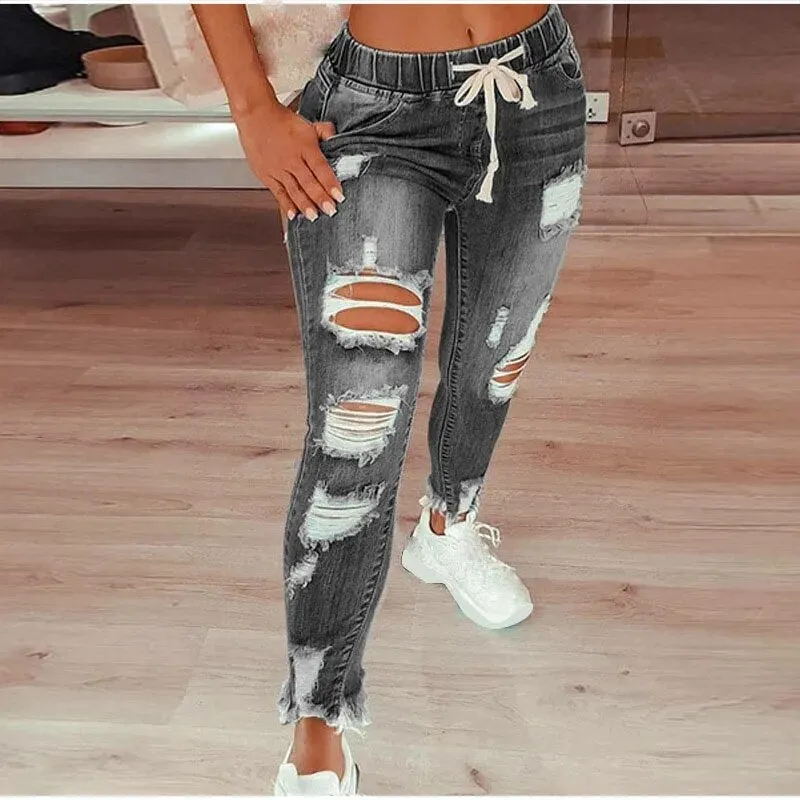 Women's Ripped Jeans with Hollow Out Design and Drawstring Closure